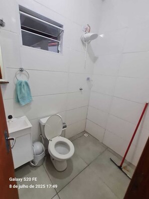 Shower, towels, soap, toilet paper