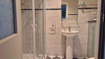 Hair dryer, towels, soap, shampoo