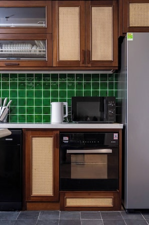 Family Apartment, Lake View | Private kitchen | Fridge, microwave, oven, stovetop