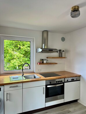 Apartamento, vista para o pátio | Cozinha privada