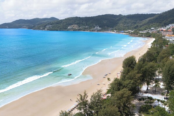 On the beach, sun loungers, beach towels