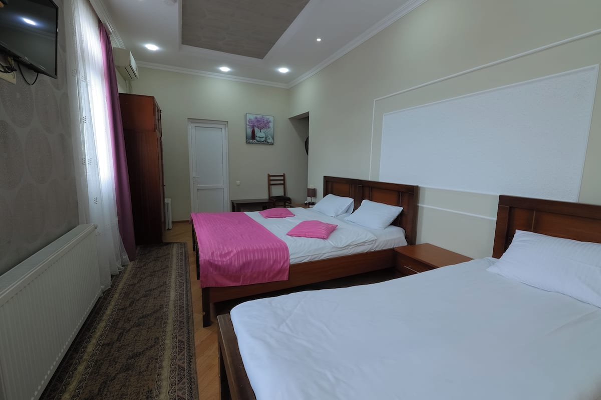 Triple Room, Balcony, Garden View | Blackout drapes, soundproofing, iron/ironing board, free WiFi