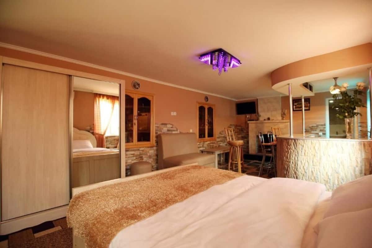 Family Suite, Garden View | Blackout drapes, soundproofing, iron/ironing board, free WiFi