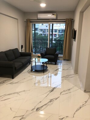 Living area - ASPA-Home Away From Home. Spacious, Comfortable, Safe & Neat apartments. (Navi Mumbai)