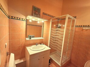 Shower, towels, soap, toilet paper