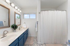 Hair dryer, towels, soap, toilet paper