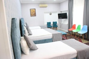 Desk, soundproofing, iron/ironing board, rollaway beds