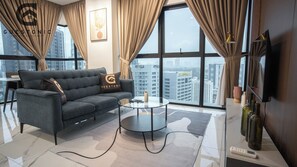 Apartamento, 2 quartos | Área de estar