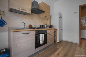 Appartement Deluxe, balcon, vue jardin | Cuisine privée