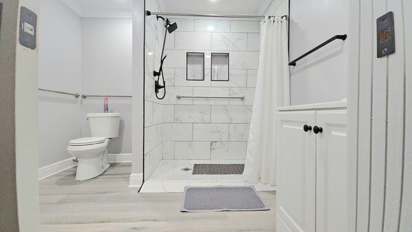 Shower, hair dryer, towels, soap