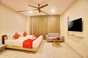 Luxury Double Room, City View | Desk, laptop workspace, blackout drapes, iron/ironing board