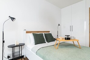 1 habitación, tabla de planchar con plancha, wifi gratis y ropa de cama 