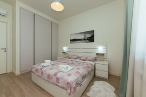 2 habitaciones, tabla de planchar con plancha, wifi y ropa de cama 