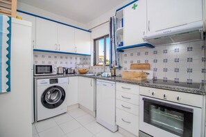 Fridge, microwave, oven, dishwasher