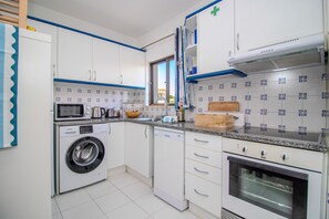 Fridge, microwave, oven, dishwasher