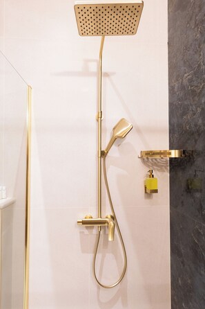 Shower, hair dryer, towels, soap