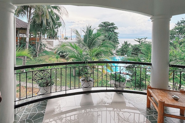 Bungalow Deluxe, balcón, vistas parciales al mar | Terraza o patio
