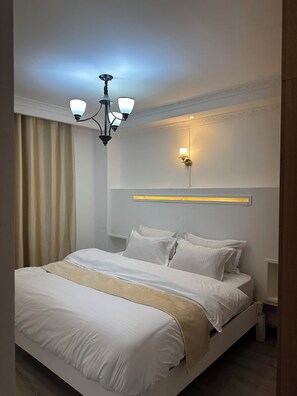 3 chambres, fer et planche à repasser, Wi-Fi, draps fournis