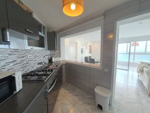 Private kitchen - Sea view apartment with 2 bedrooms. Near Puerto de la Cruz, 5 min by car from the beach (CN)