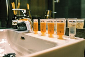 Shower, towels, soap, toilet paper