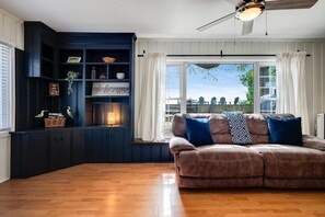 Smart TV, fireplace, DVD player, books