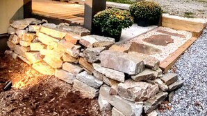 A stone pathway leading to a wooden structure with a red roof, surrounded by gravel and greenery. - Cozy, arts and crafts loft located in the WNC mountains in Black Mtn, NC (Black Mountain)