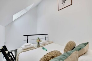 1 bedroom, laptop workspace, iron/ironing board, bed sheets