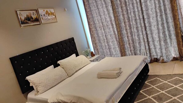1 habitación, tabla de planchar con plancha, wifi y ropa de cama 