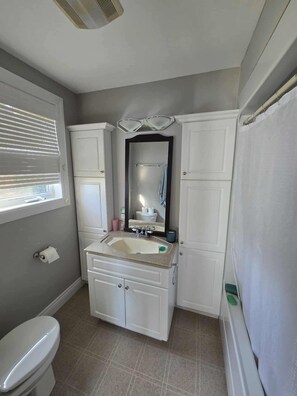 Hair dryer, towels, soap, toilet paper