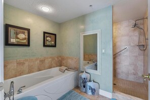 Jetted bath, hair dryer, towels, soap