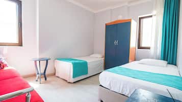 Premium bedding, blackout curtains, iron/ironing board, free WiFi