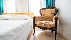 Premium bedding, blackout curtains, iron/ironing board, free WiFi