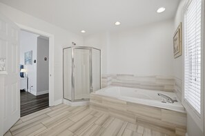 Shower, jetted bath, hair dryer, towels