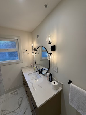 Hair dryer, towels, soap, toilet paper