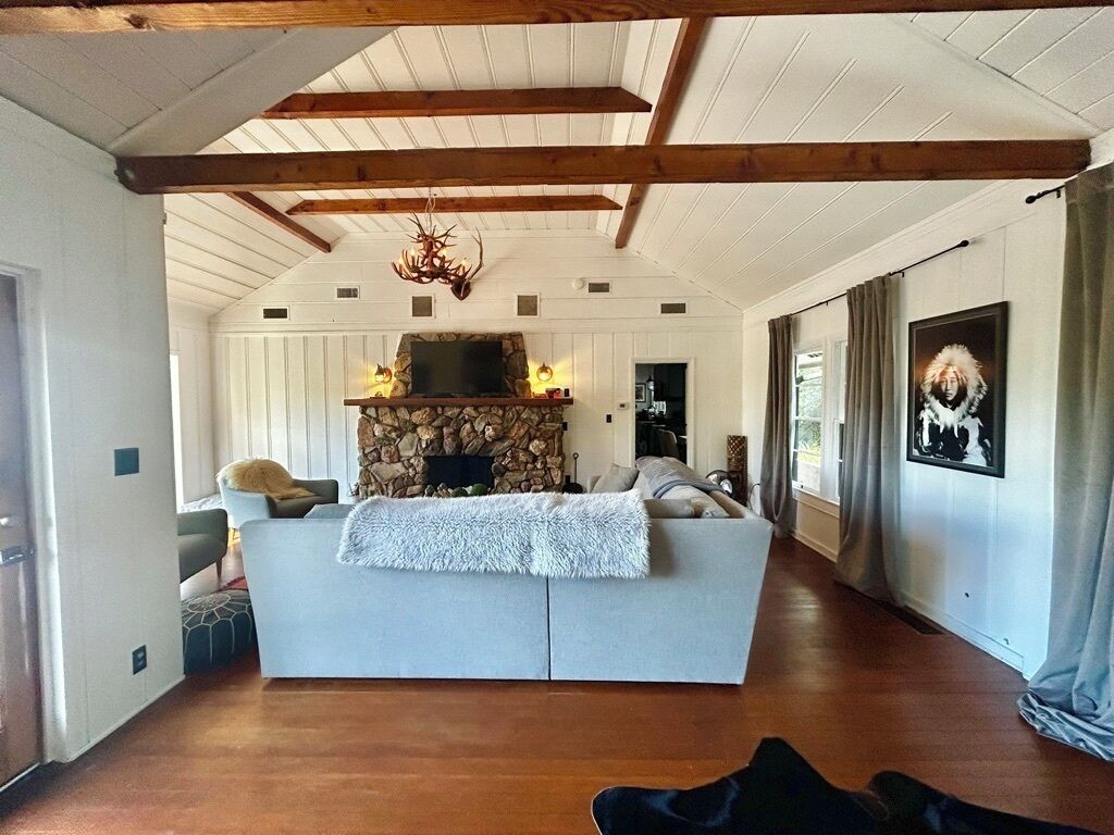 Smart TV, fireplace, books