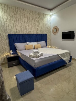 1 habitación, tabla de planchar con plancha, wifi y ropa de cama 