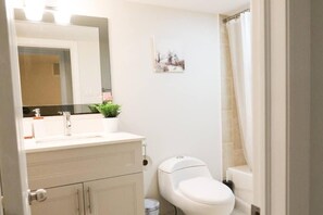 Hair dryer, towels, soap, toilet paper