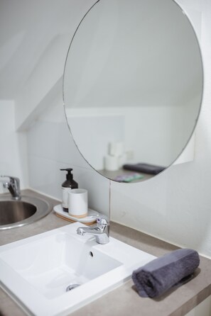 Hair dryer, towels, soap, shampoo