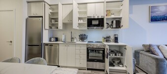 Luxury Two Bedroom Condo w/ King Bed & Gym