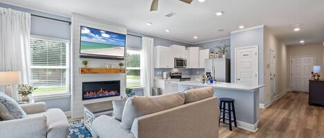 Una Smart TV, una chimenea, videojuegos