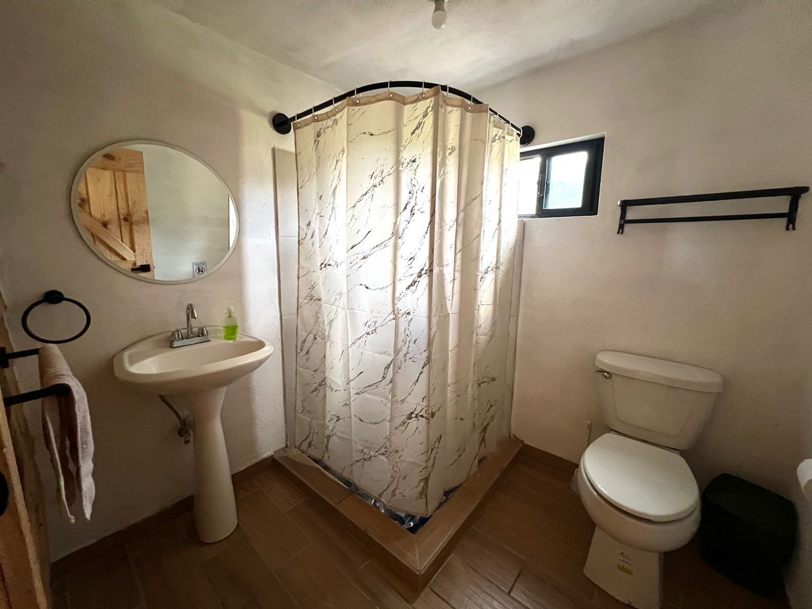 Shower, towels, soap, toilet paper