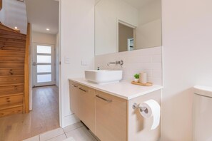 Hair dryer, towels, soap, shampoo