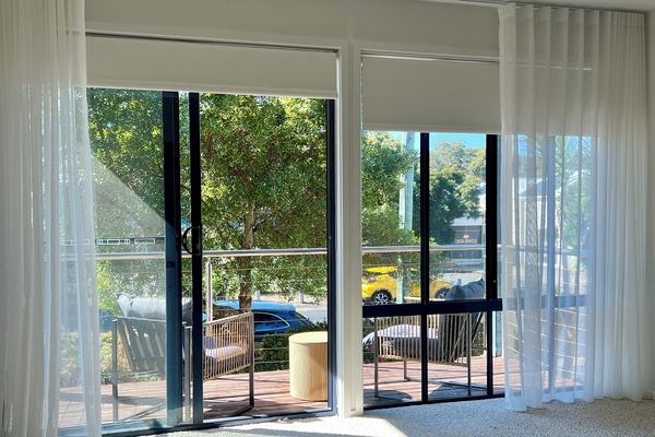 upstairs living room with balcony, district outlook