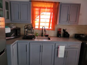 Standard Apartment, Non Smoking, Garden View | Private kitchen | Fridge, microwave, stovetop, cookware/dishes/utensils - Silverbuttons  (St. John's)