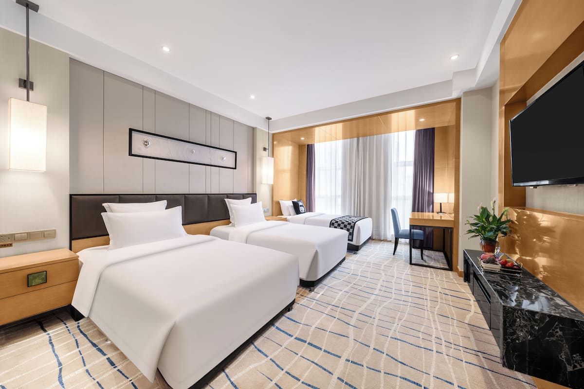 Family Triple Room, Multiple Beds | In-room safe, desk, laptop workspace, blackout drapes