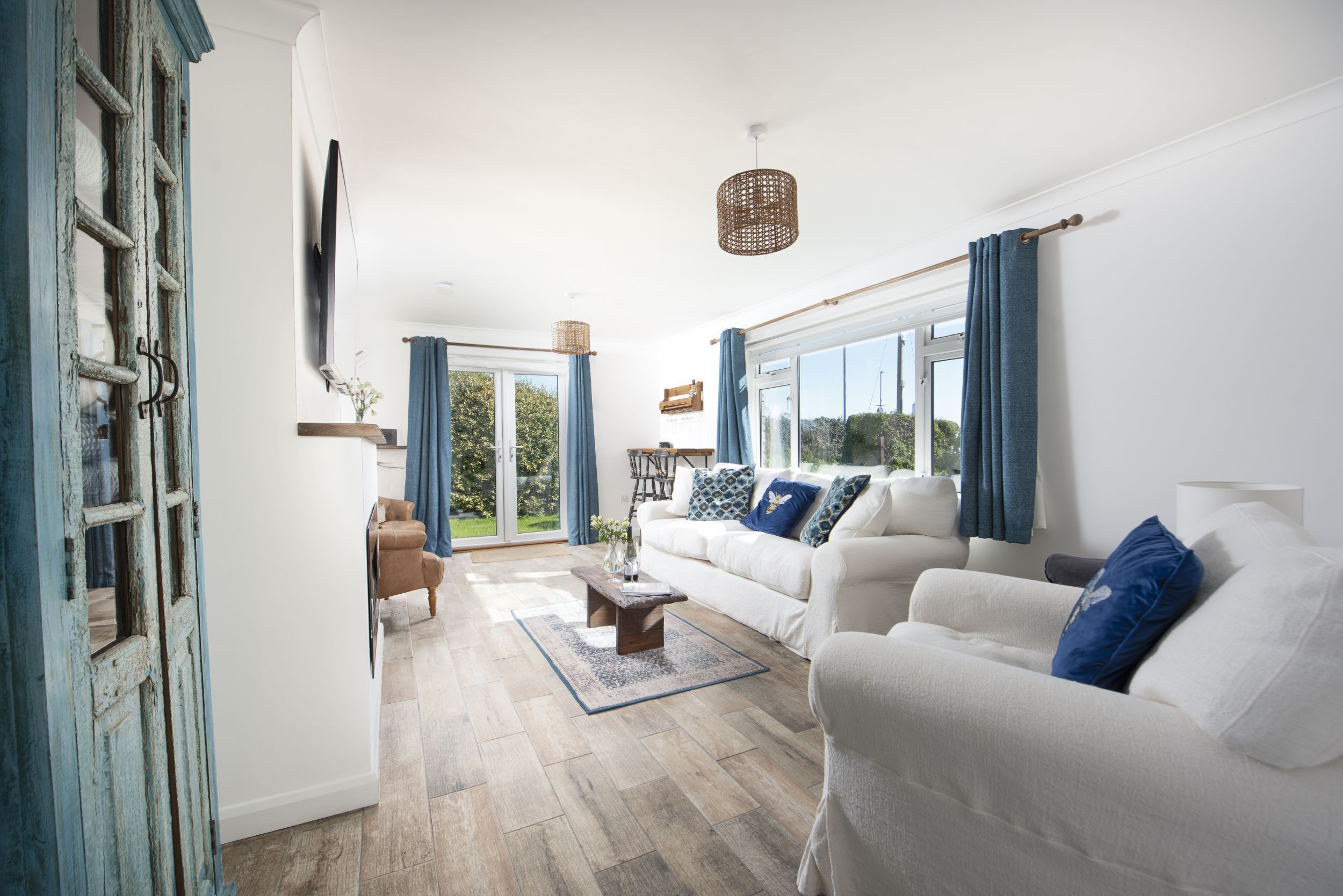 TV, fireplace, books