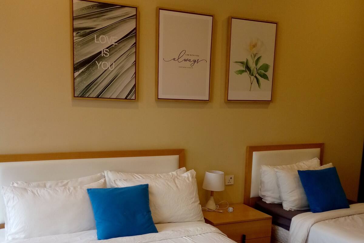 Deluxe Triple Room, City View | In-room safe, free WiFi