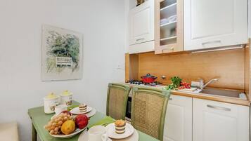 Standard Apartment, 1 Bedroom (Il Giardino Sul Mare) | Private kitchen | Fridge, oven, stovetop, coffee/tea maker