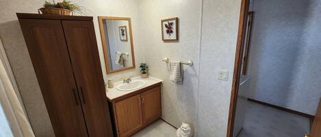 Hair dryer, towels, soap, toilet paper