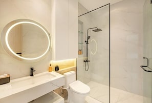 Shower, hair dryer, towels, soap